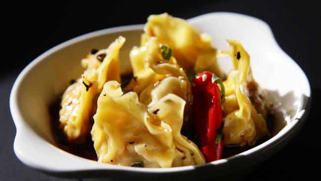 Pork and prawn dumplings at Happy Boy. Picture: AAP/Claudia Baxter