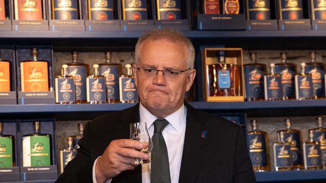 Mr Morrison has a Friday morning taste of whisky while visiting the Lark Distillery in Hobart. Picture: Jason Edwards