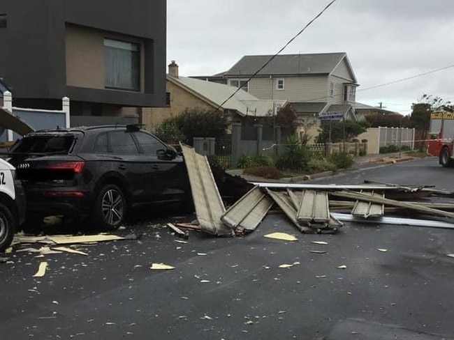 Roofs fly off homes in the Chelsea area.