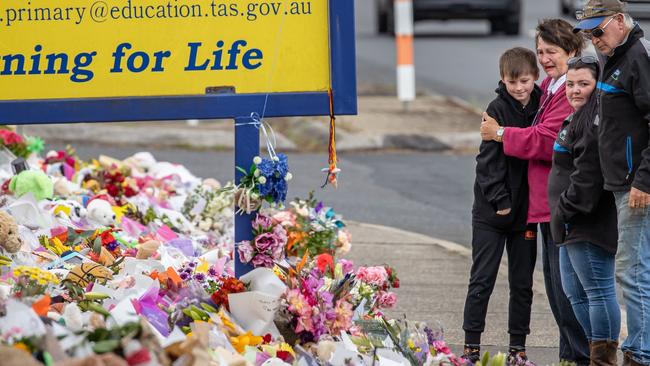 Mourners pay their respects to the six children killed in a jumping castle tragedy at Hillcrest Primary School in Devonport Tasmania. Picture: Jason Edwards