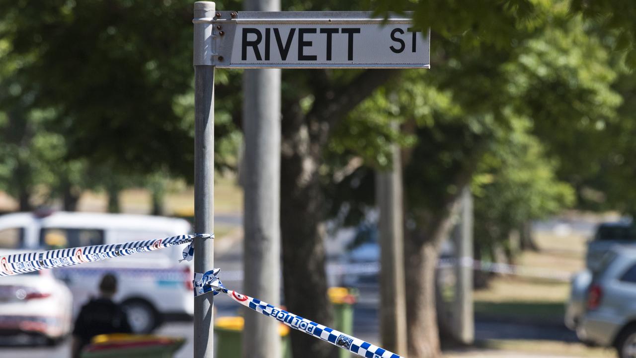 Police and fire investigators at a South Toowoomba crime scene following a fatal house fire in Rivett St, South Toowoomba. Picture: Kevin Farmer