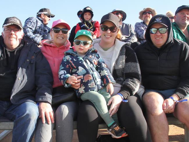 Ron, Sandy, Riley, Jodie, and Dale from Melbourne. Finke fever has gripped Alice Springs, with hundreds of punters coming to catch all the action at the 2025 Tatts Finke Desert Race Prologue, Saturday, June 7. Picture: Gera Kazakov