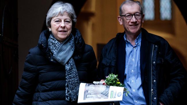 Theresa May and her husband Philip leave church on Sunday. Picture: Getty Images.