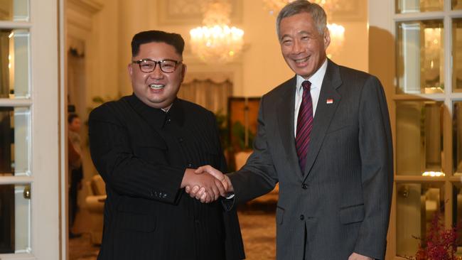 North Korea's leader Kim Jong-un is welcomed by Singapore's Prime Minister Lee Hsien Loong. Picture: AFP