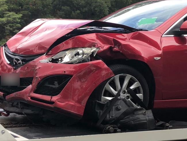 A wrecked Mazda station wagon, driven by a woman in her 80s, was involved in a three-car crash in at Forestville. Picture: Jim O’Rourke