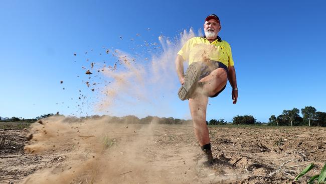 The record breaking floods that swept over Mick Andrejic's Freshwater farm last December have left a layer of silt up to six feet high in some areas. The flooding has affected 250 acres of land used for sugar cane farming, with crop growth and harvesting heavily impacted. Picture: Brendan Radke