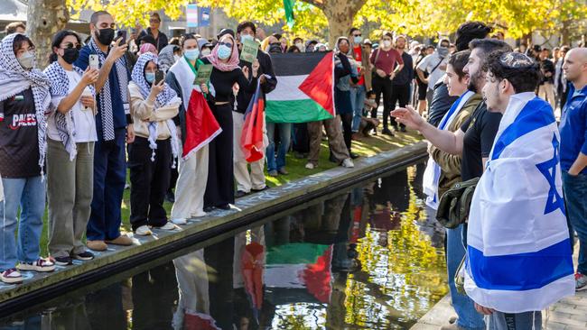 Melbourne University students and their supporters from the Jewish and pro-Palestinian camps face off on Thursday. Picture: Jason Edwards