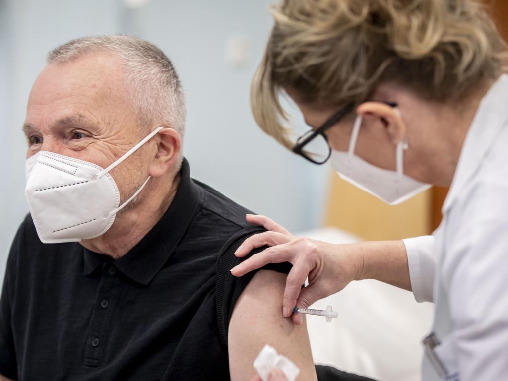 A doctor receives the first vaccine injection in the Czech Republic. Picture: Gabriel Kuchta/Getty Images.