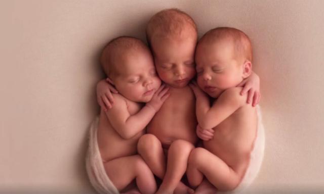 Red-headed triplets melt the internet's heart
