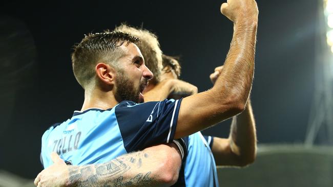 Michael Zullo of Sydney FC celebrates David Carney’s goal.