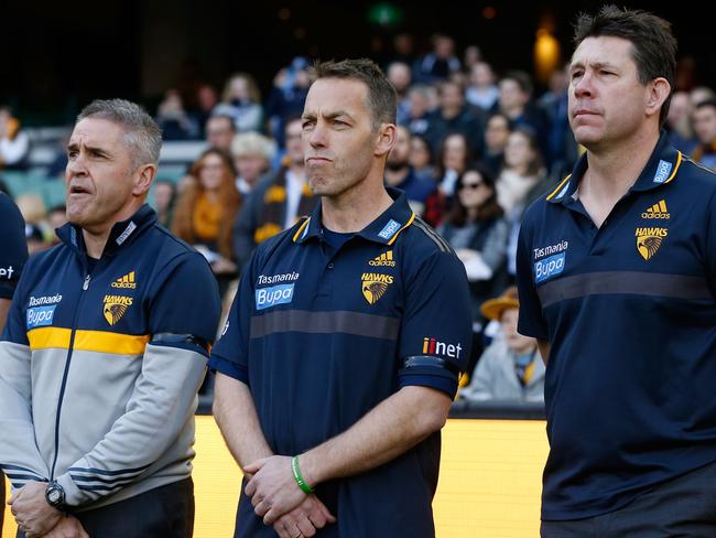 Chris Fagan, Alastair Clarkson and Brett Ratten before a Hawthorn game.