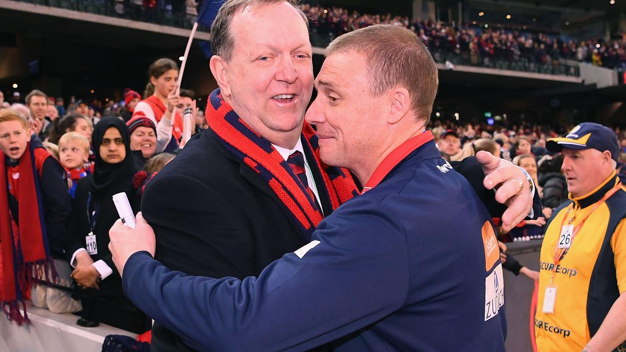 Melbourne president Glen Bartlett hugs coach Simon Goodwin after the Demons beat Greater Western Sydney in the final round of the 2018 season. Picture: Getty Images