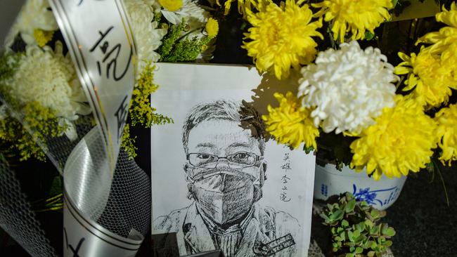 A floral tribute for Li Wenliang left at Wuhan Central Hospital. Picture: AFP