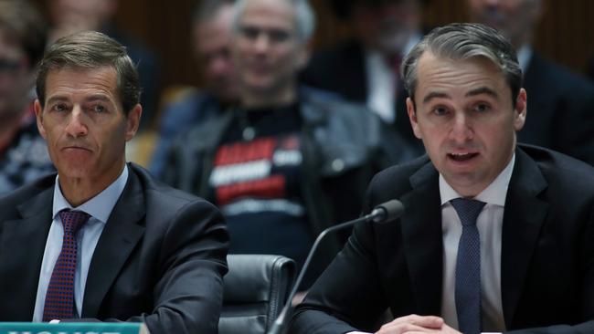 Deputy Chief Executive Officer David Cohen with the CEO of the Commonwealth Bank Matt Comyn, during a public hearing at Parliament House in Canberra. Picture Gary Ramage