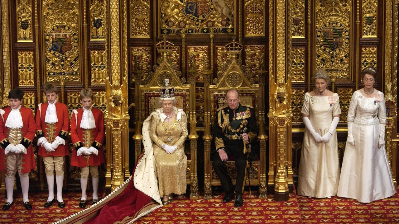 The late Queen Elizabeth II And Prince Philip accompanied by ladies-in-waiting (Lady Susan Hussey on the far right) and pages of honour. Picture: Tim Graham Photo Library via Getty Images.