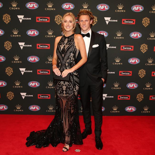 GWS Giants’ Lachie Whitfield and Brigitta Olsen. Picture: Michael Klein