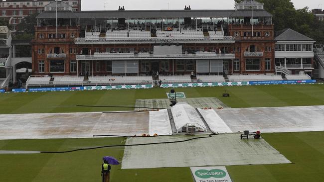 The covers protect the pitch from the rain ahead of play on the first day of the second Ashes Test. Picture: AFP