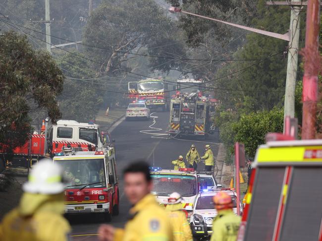 Emergency services attend the fires near Canoon Rd and Barwon Ave. Picture: John Grainger