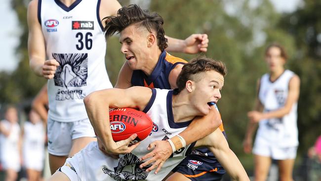 Keidan Rayner is tackled by Sam Ramsay.