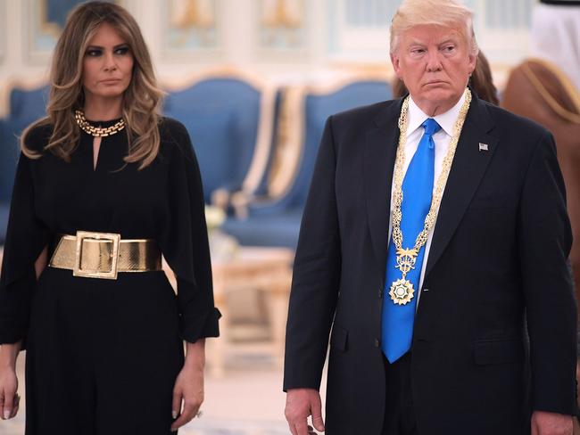 US President Donald Trump and First Lady Melania Trump make their way to a luncheon after Trump received the Order of Abdulaziz al-Saud medal from Saudi Arabia's King Salman bin Abdulaziz al-Saud at the Saudi Royal Court in Riyadh on May 20, 2017. Picture: Mandel Ngan