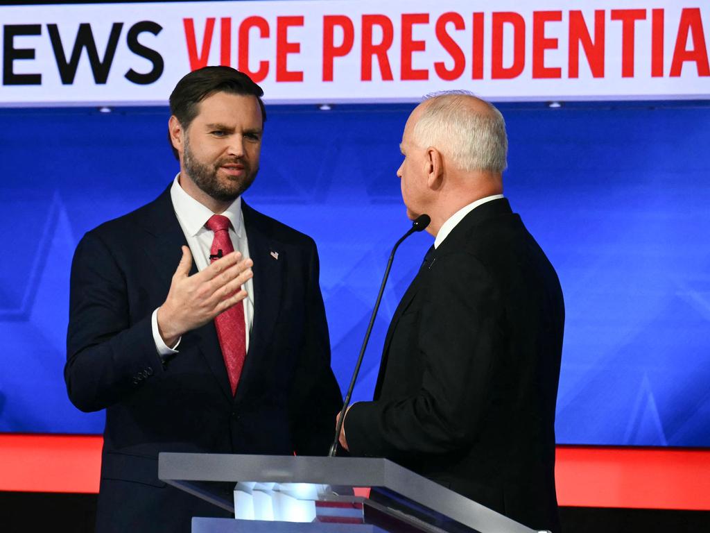 J.D. Vance (left) and Tim Walz at this week’s vice-presidential debate. Picture: Angela Weiss/AFP