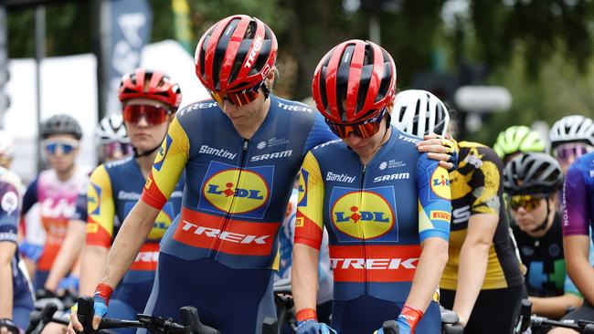 Brodie Chapman (left) consoles Amanda Spratt during a minute silence for Melissa Hoskins before the race. Picture: Con Chronis/AusCycling.