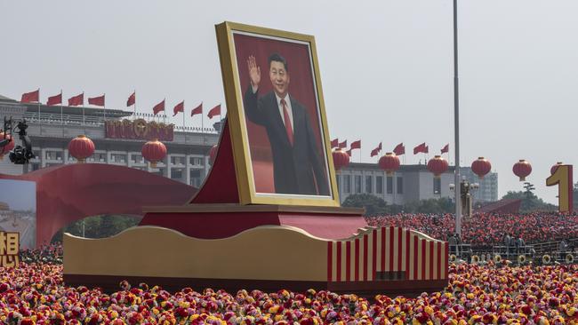 A giant portrait of Chinese President Xi Jinping is carried atop a float at a parade to celebrate the 70th Anniversary of the founding of the People's Republic of China in 1949 , at Tiananmen Square on October 1, 2019 in Beijing, China. (Photo by Kevin Frayer/Getty Images)