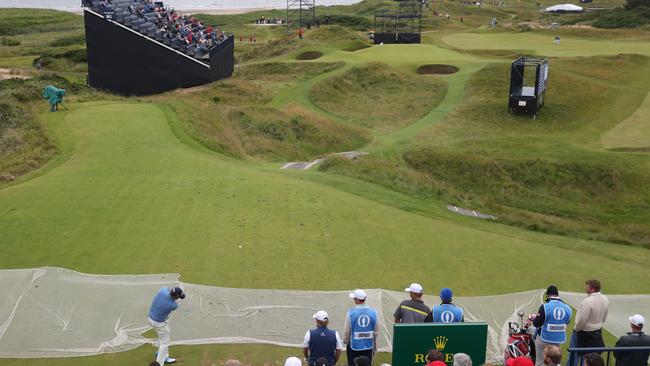 Jason Dufner of the US plays of the 8th tee, the hole a par 3, is 123 yards long and known as the 'postage stamp' during a practice round for the British Open Golf Championships at the Royal Troon.