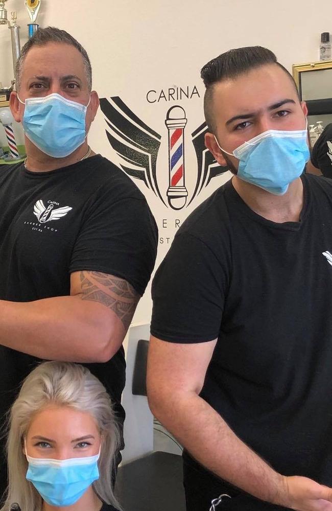 Carina Barber Shop owner Theo Petrou with barbers Shalom and Adele. Picture: Supplied