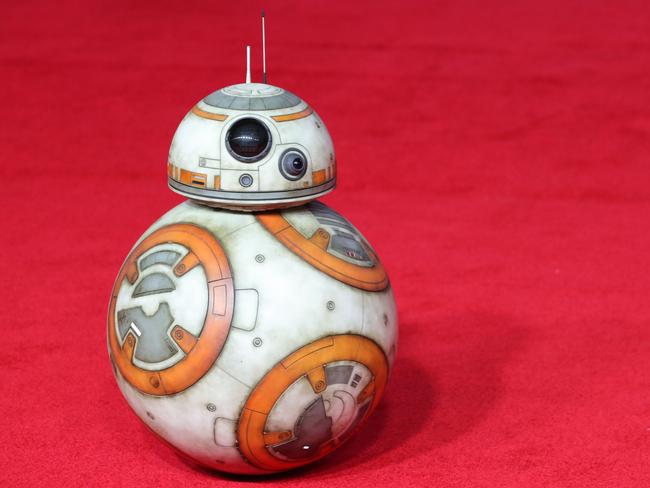 BB-8 got up close to the royals. Picture: AFP