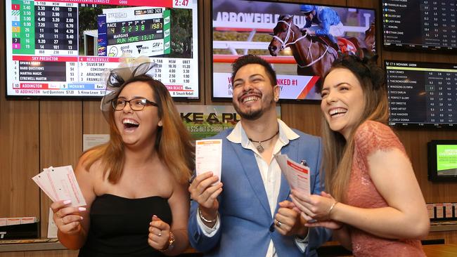 Here’s hoping there are plenty of happy faces like these ones after you all follow our betting strategy on tomorrow’s Melbourne Cup. Picture: File