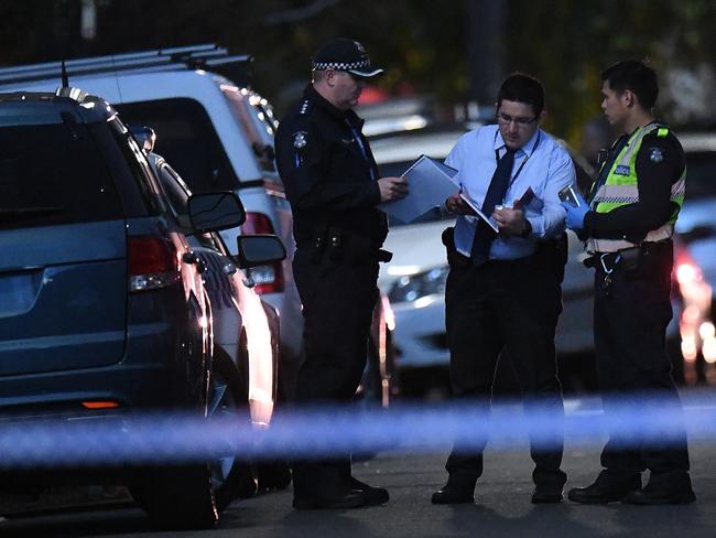 Investigators outside the house in Westbank Terrace. Picture: AAP/Julian Smith