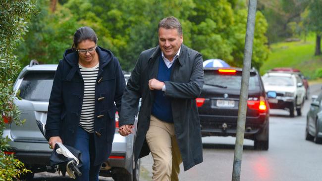 Liberal Party Member for Mayo Jamie Briggs and his wife Estee Fiebiger arrive at a polling booth in the suburb of Stirling in the Adelaide Hills. He set to lose the seat.