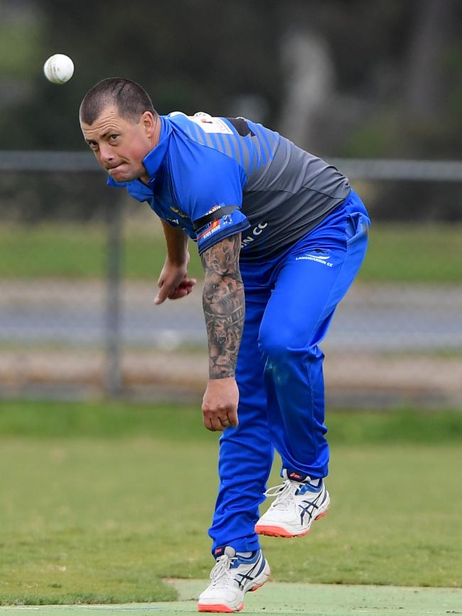 Travis Campbell lets fly for Langwarrin. Picture: Andy Brownbill