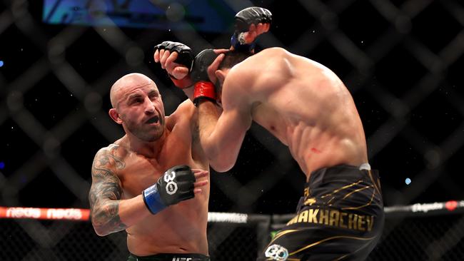 PERTH, AUSTRALIA – FEBRUARY 12: Alex Volkanovski of Australia battles Islam Makhachev of Russia in the UFC lightweight championship fight during UFC 284 at RAC Arena on February 12, 2023 in Perth, Australia. (Photo by Paul Kane/Getty Images)