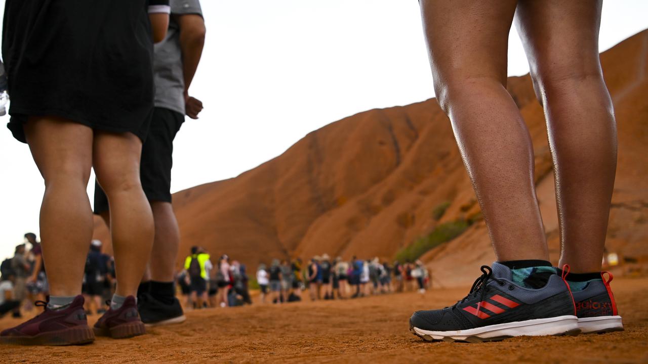 From tomorrow, people who climb Uluru will face hefty fines. Picture: AAP Image/Lukas Coch