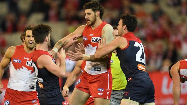 Angry Swans players remonstrate with Tom Bugg after last year’s ugly incident. Pic: AAP