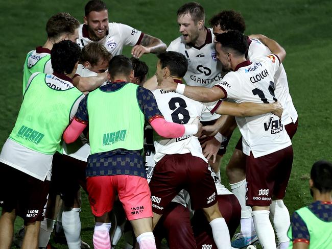 SYDNEY, AUSTRALIA - JANUARY 06: Luka Jovanovic of Adelaide United celebrates with team mates after scoring a goal during the round 12 A-League Men match between Macarthur FC and Adelaide United at Campbelltown Stadium on January 06, 2025, in Sydney, Australia. (Photo by Matt Blyth/Getty Images)