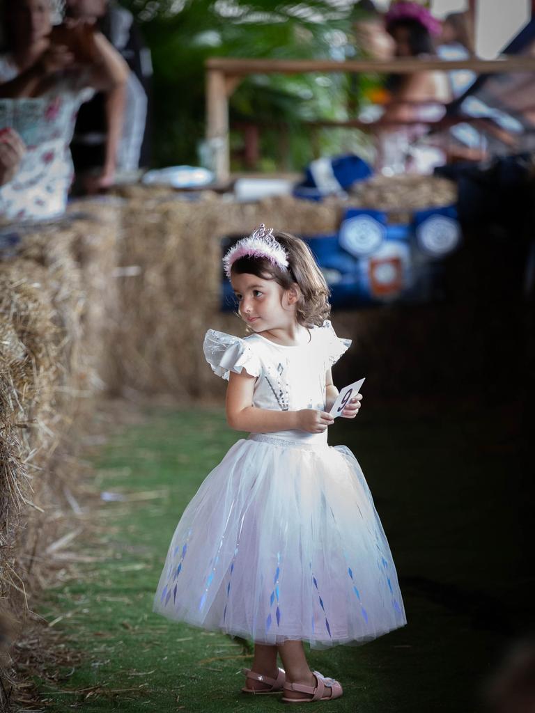 Croc racing at the Berry Springs Tavern for Melbourne Cup Day: Shayla Holmes, 4, takes part in the ‘Fashions in the Bush’ event. Picture: GLENN CAMPBELL