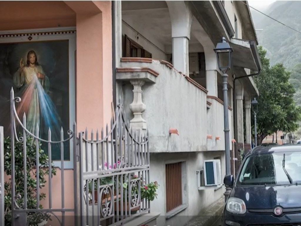 A religious image on a house in Plati, the home of the Ndrangheta.