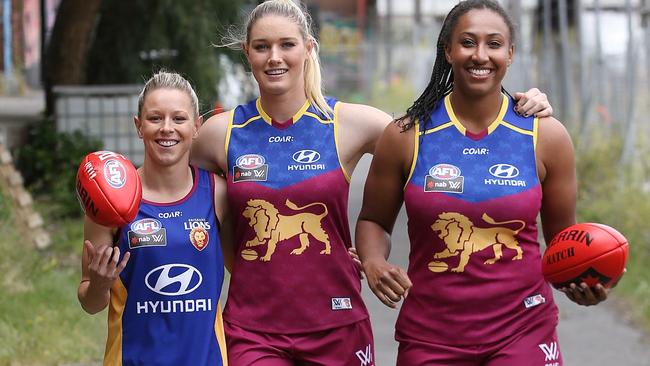 Tayla Harris (middle) with Brisbane teammates Kate McCarthy (left) and Sabrina Frederick. Picture: Wayne Ludbey