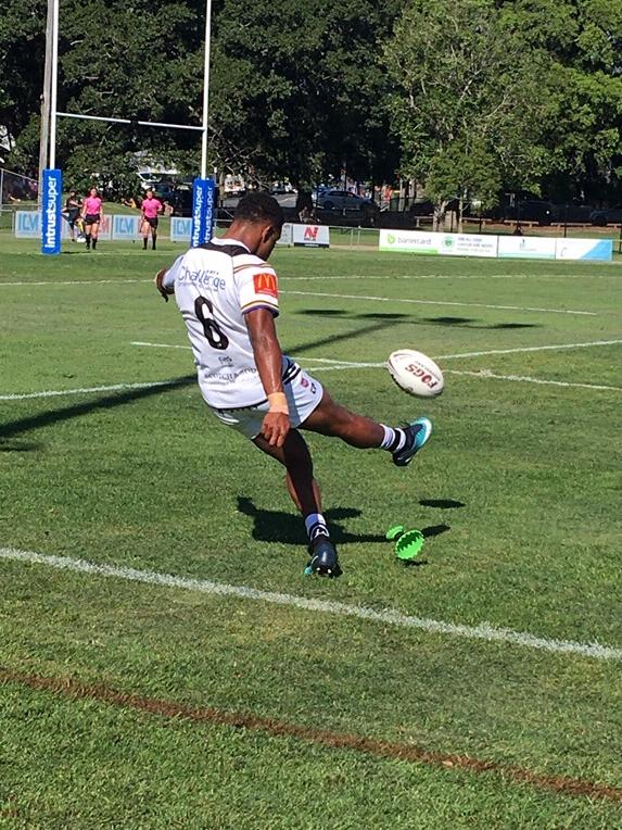 Ezra Mam kicking for goal for Souths Logan’s Meninga Cup side.