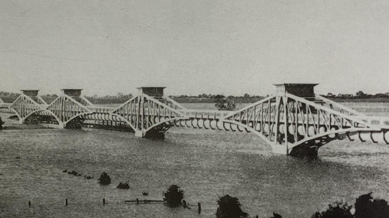 A historical photo of the aqueduct with the Barwon River in flood.