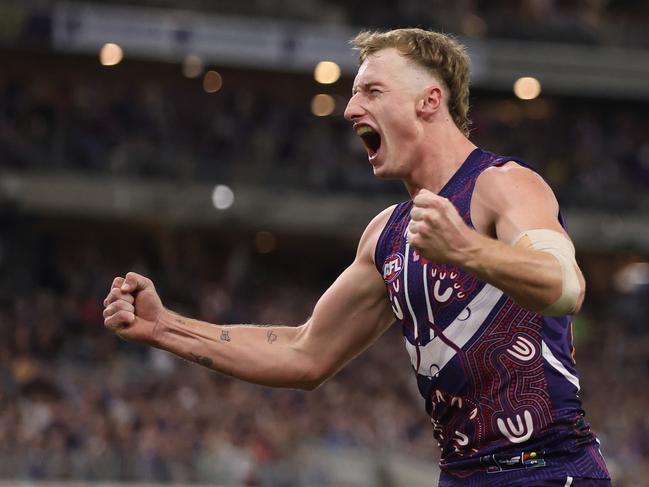 Josh Treacy of the Dockers celebrates after scoring a goal. Photo by Will Russell/AFL Photos via Getty Images.