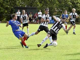 CUP CLASH: USQ's Ashley Freier (left) competes for the ball with Willowburn's Matthew Meiklejohn and Adam Daly (right). USQ won the FFA Cup game 2-0. Picture: Bev Lacey