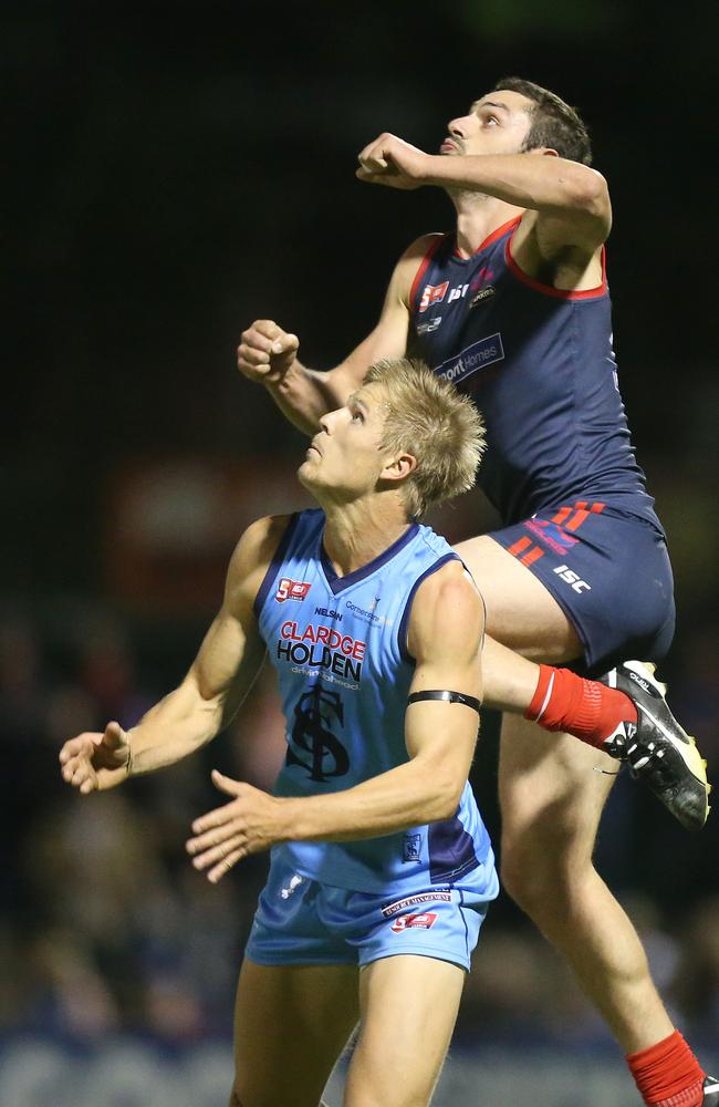 Norwood’s Alex Georgiou gets airborne at Norwood Oval. Picture: Stephen Laffer