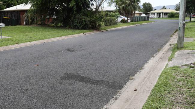 Blood stains on the road where the two boys were treated by paramedics. Picture: Brendan Radke