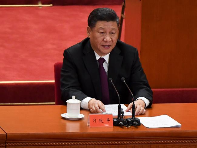 CORRECTION - China's President Xi Jinping gives a speech during a celebration meeting marking the 40th anniversary of China's reform and opening up at the Great Hall of the People in Beijing on December 18, 2018. (Photo by WANG Zhao / AFP) / “The erroneous mention[s] appearing in the metadata of this photo by WANG Zhao has been modified in AFP systems in the following manner: [correcting Source to AFP instead of Pool]. Please immediately remove the erroneous mention[s] from all your online services and delete it (them) from your servers. If you have been authorized by AFP to distribute it (them) to third parties, please ensure that the same actions are carried out by them. Failure to promptly comply with these instructions will entail liability on your part for any continued or post notification usage. Therefore we thank you very much for all your attention and prompt action. We are sorry for the inconvenience this notification may cause and remain at your disposal for any further information you may require.”