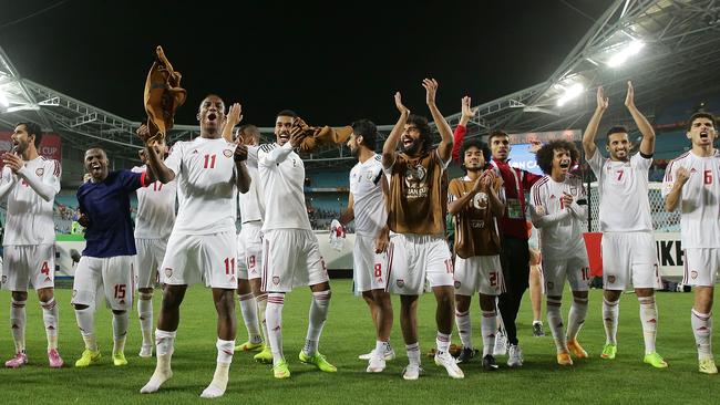 SYDNEY, AUSTRALIA - JANUARY 23: United Arab Emirates players celebrate after winning the penalty shoot out during the 2015 Asian Cup Quarter Final match between Japan and the United Arab Emirates at ANZ Stadium on January 23, 2015 in Sydney, Australia. (Photo by Mark Metcalfe/Getty Images)