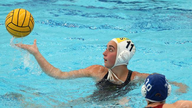 Under 19 Australian Water Polo Championships - Saskia Dunn of the Youth Barbarians under pressure from Nicolette Miller of South Australia on Saturday, December 10, 2022 in St Kilda East, Victoria, Australia.